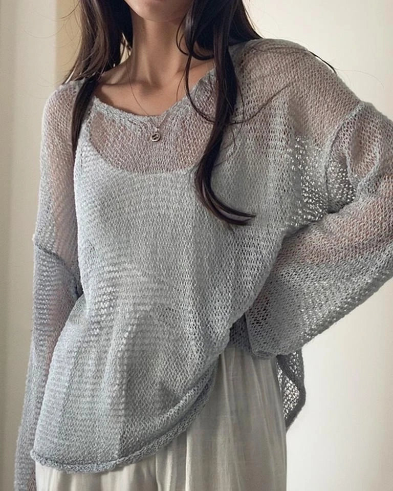 Un cardigan élégant pour femme avec un motif en maille, des manches longues et un col rond tendance