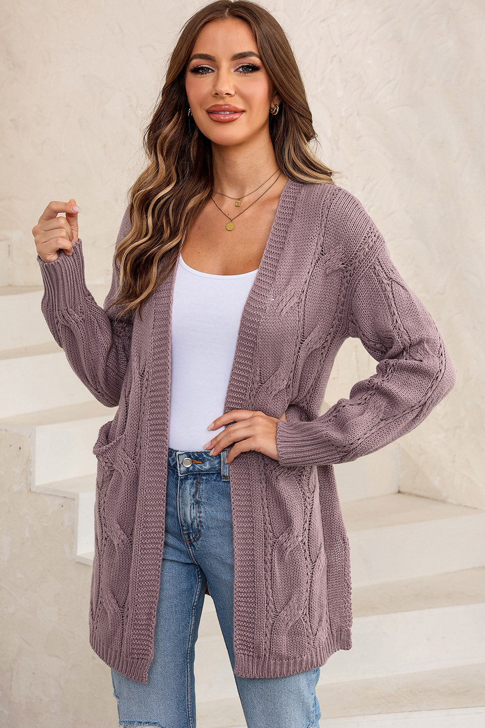 Un cardigan élégant à manches longues et grandes poches au design ouvert pour un look confortable