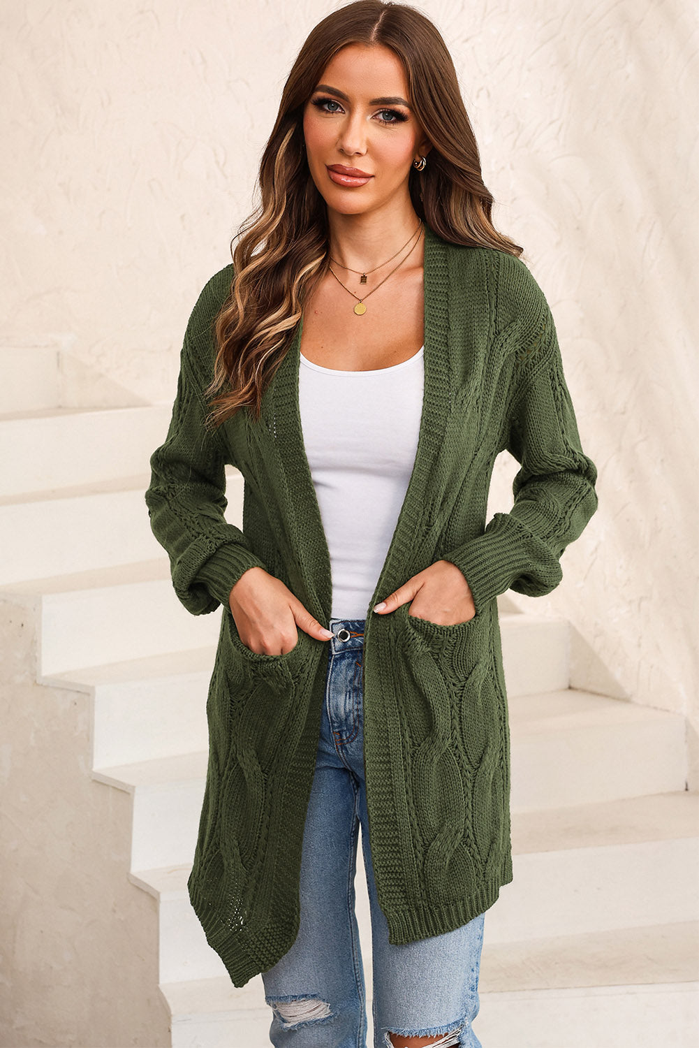 Un cardigan élégant à manches longues et grandes poches au design ouvert pour un look confortable