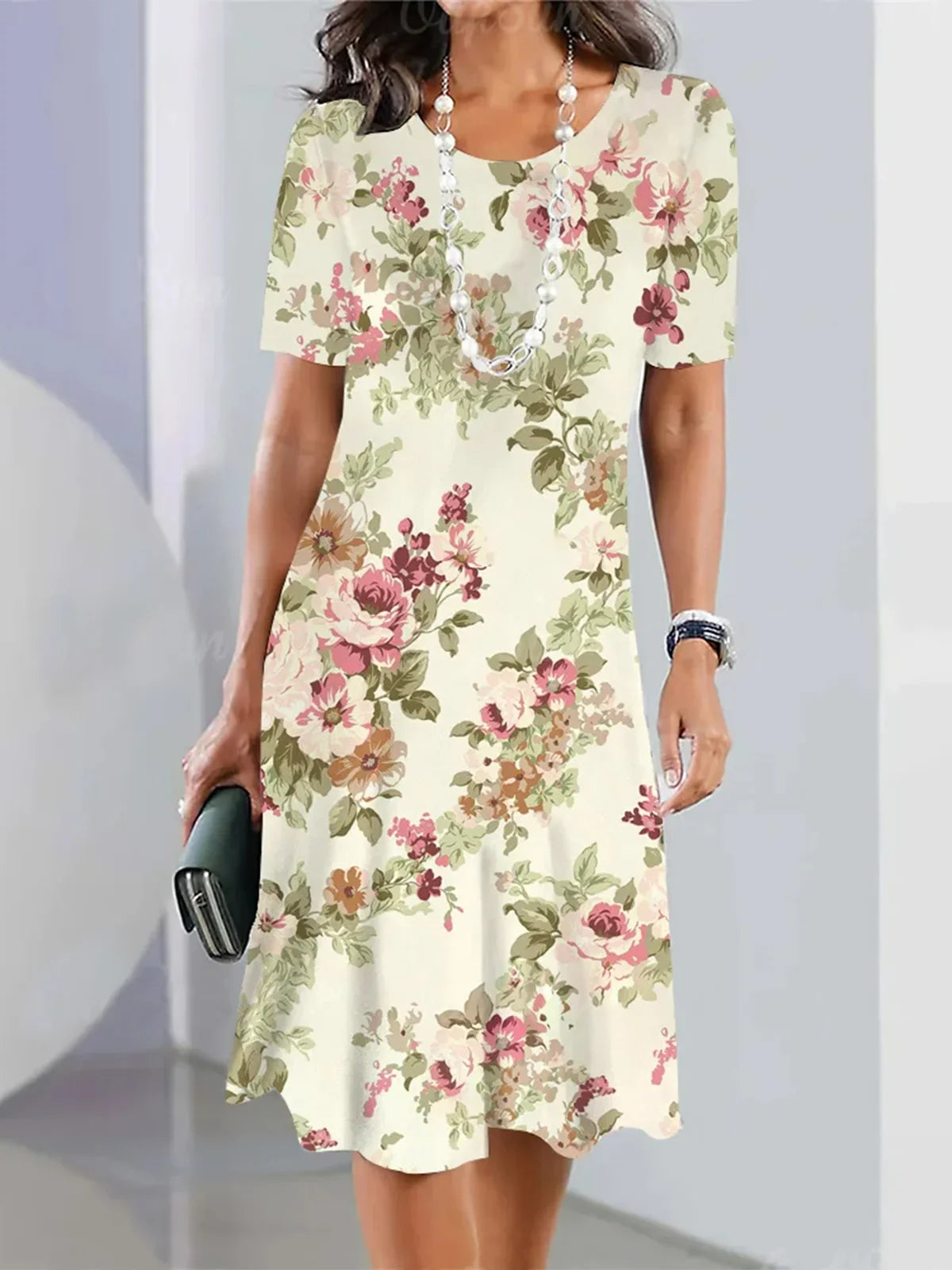 Veronica - Élégante robe midi à fleurs lâches pour garden party avec encolure ras du cou