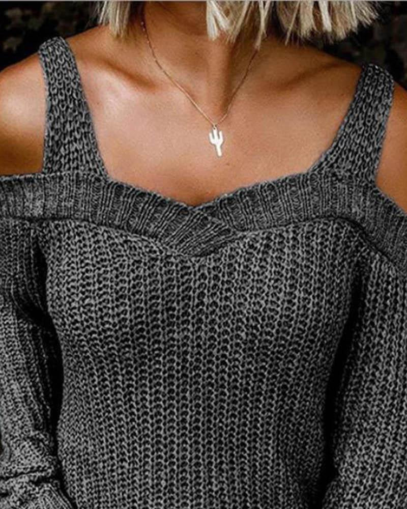 Pull élégant avec découpes aux épaules et grosse maille