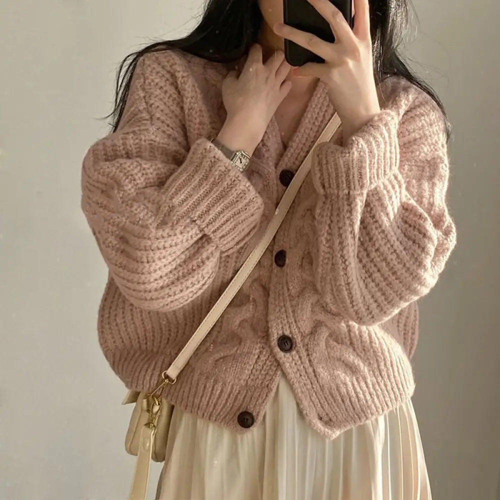 Cardigan confortable de couleur unie avec fermeture à boutons