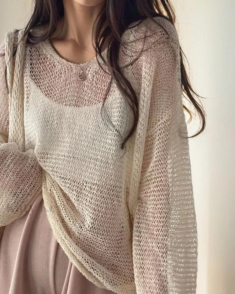 Un cardigan élégant pour femme avec un motif en maille, des manches longues et un col rond tendance