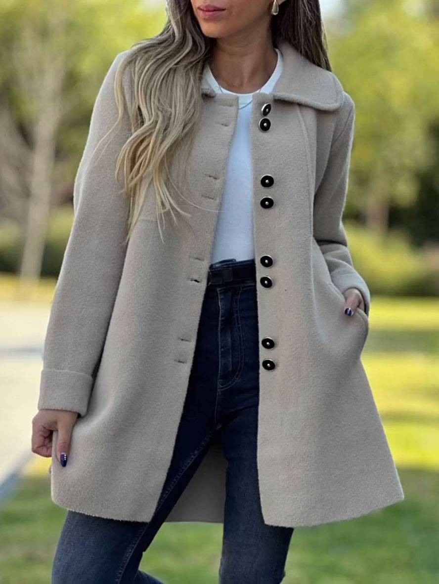 Manteau élégant pour femme, coloris uni avec boutons, poches et col à revers