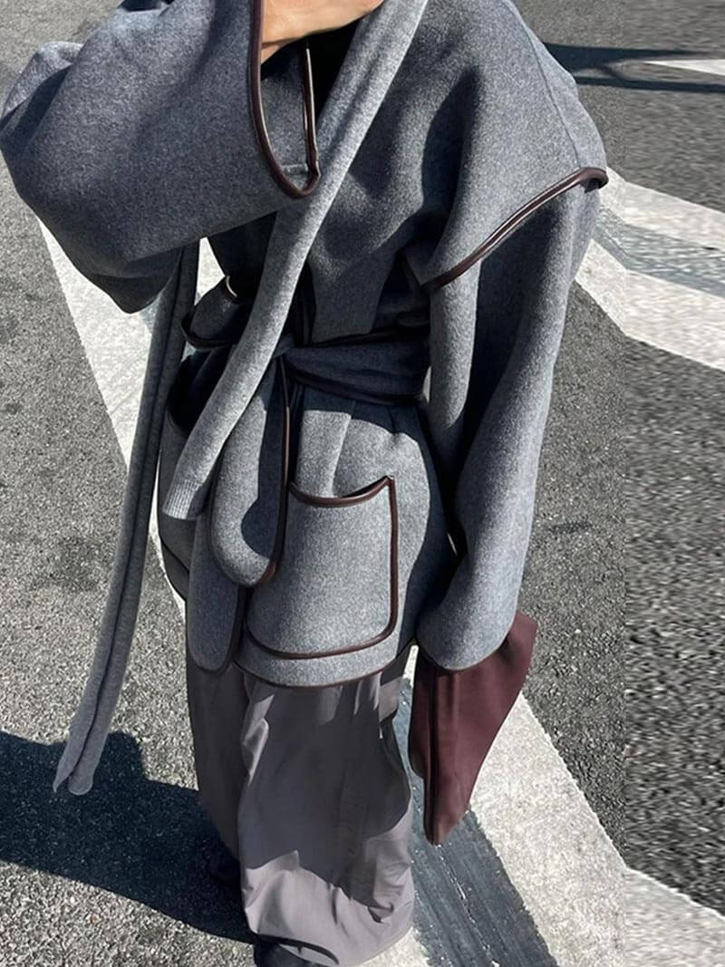 Manteau féminin moderne avec ceinture élégante