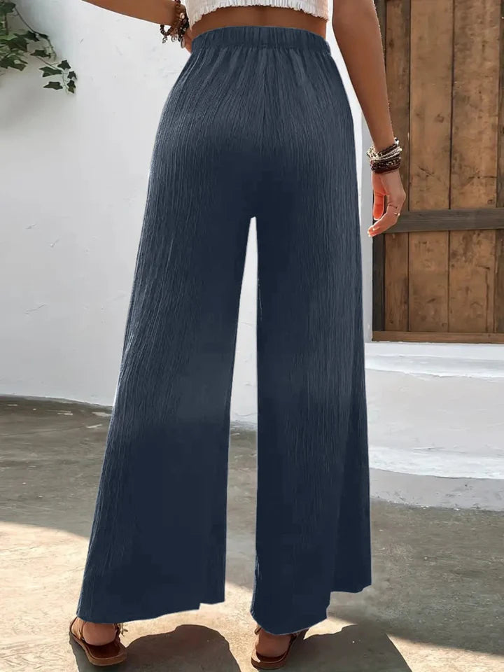 Karol - Pantalon taille haute à jambe large pleine taille